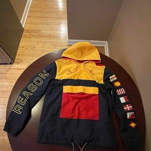 REASON windbreaker jacket size Large.